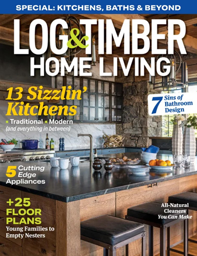 The November 2024 cover of Log & Timber Home Living features a beautiful moutain modern kitchen with a stone wall and black granite countertops.
